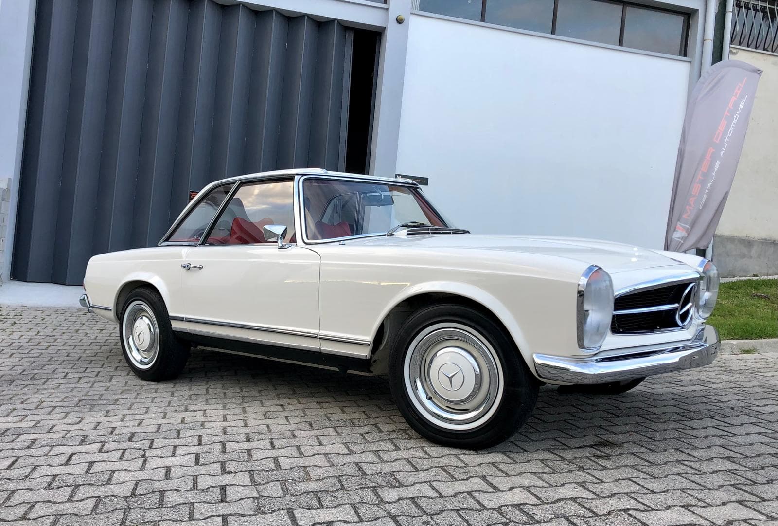 White Mercedes Pagode 280SL with red interior after full detail and wax