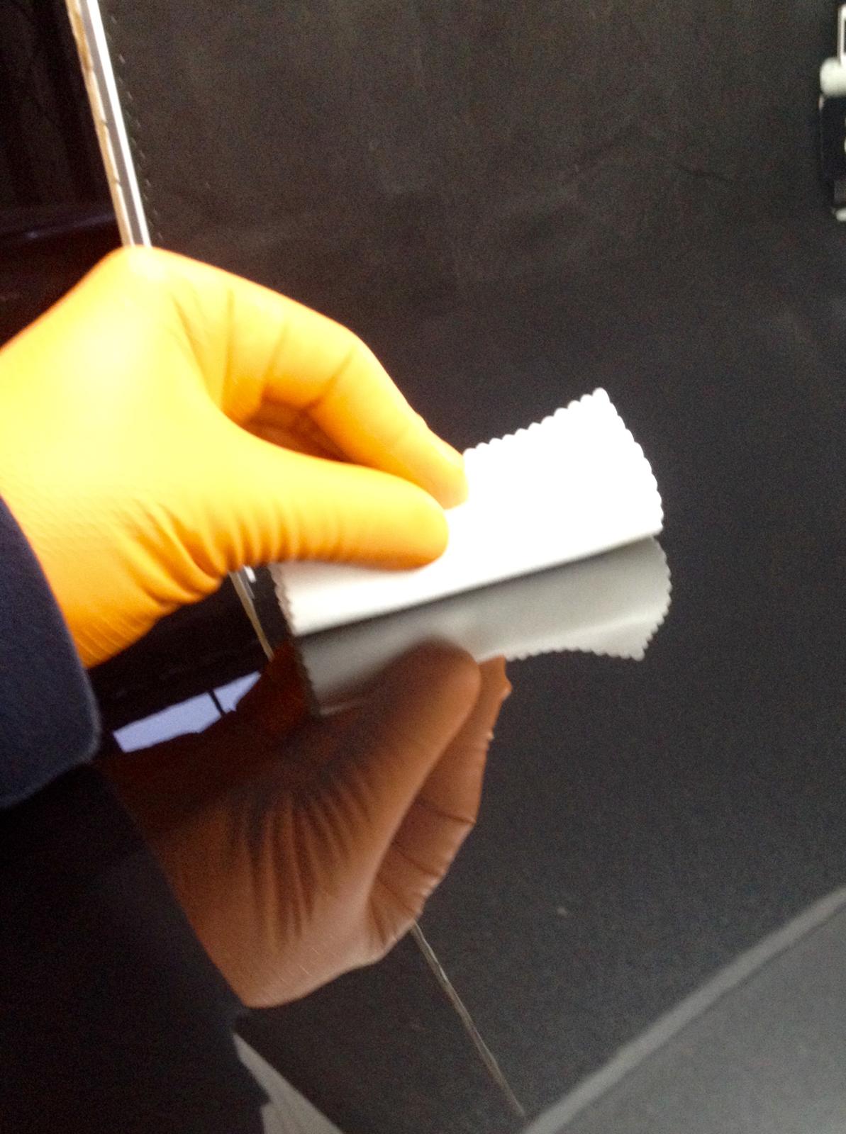 Professional ceramic coating application with specialized tools