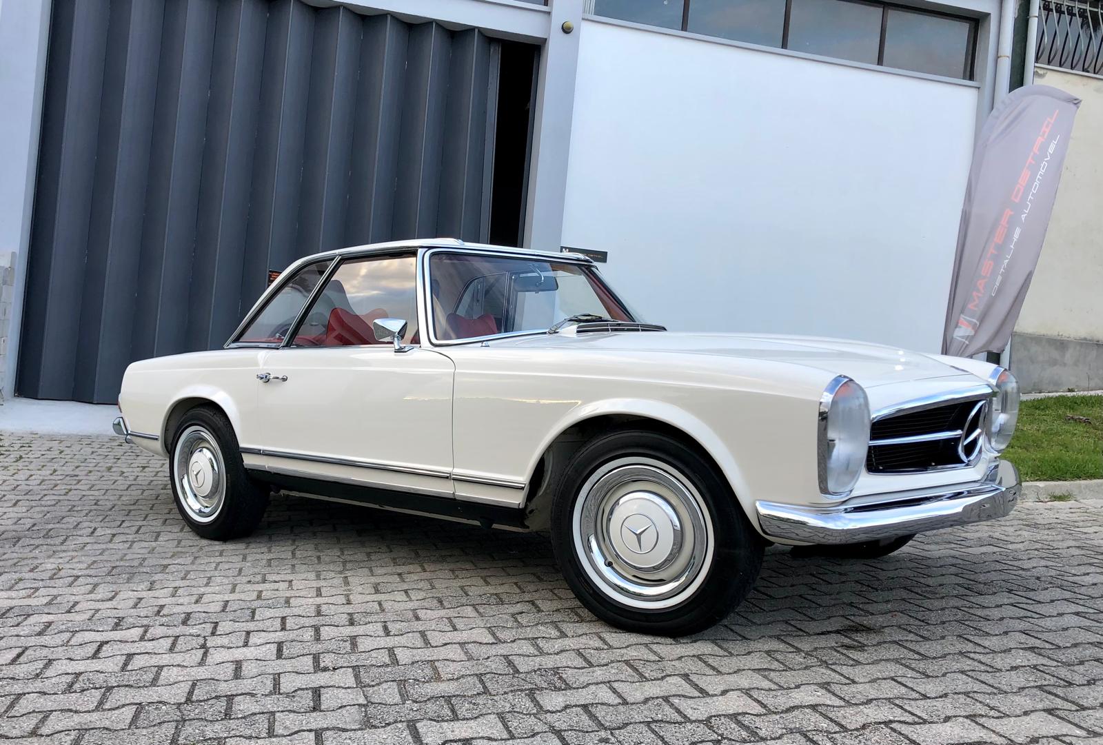White Mercedes Pagode 280SL with red interior after full detail and wax